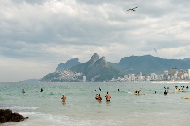 Swimmers enjoying summer at Sopot Beach on the Baltic Sea coast,